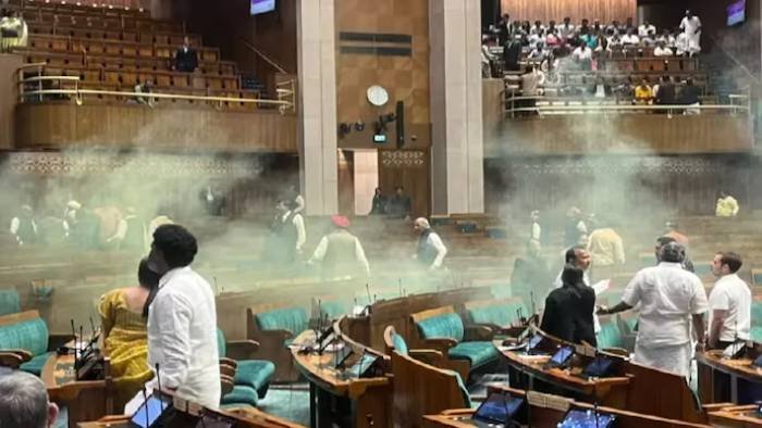a video grab shows an unidentified man jumping from the visitors gallery of lok sabha causing a sc 023326440 a video grab shows an unidentified man jumping from the visitors gallery of lok sabha causing a sc 023326440